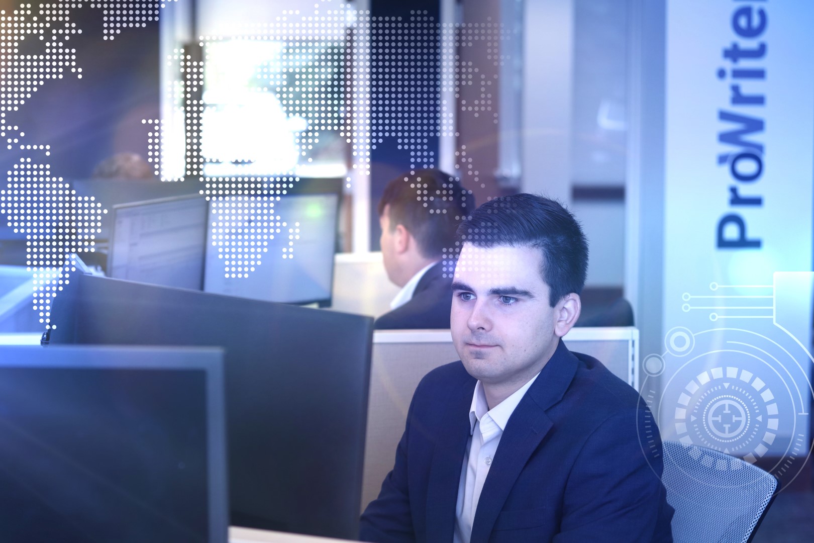 Insurance professional sits at cubicle, reviewing D&O Insurance for private companies before presenting to client.