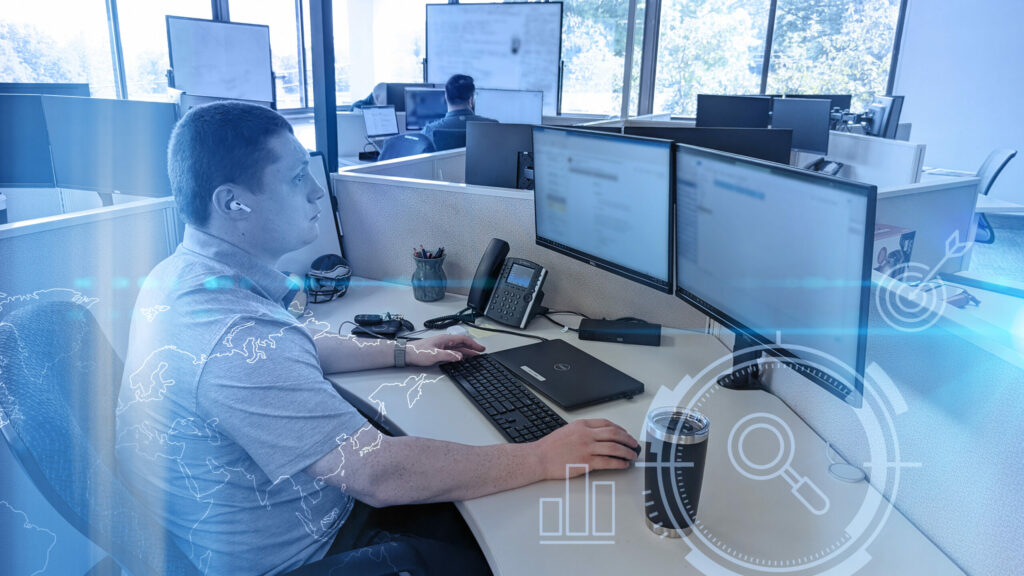 ProWriters agent scans EPL Insurance carriers via two computer screens at his office workstation.