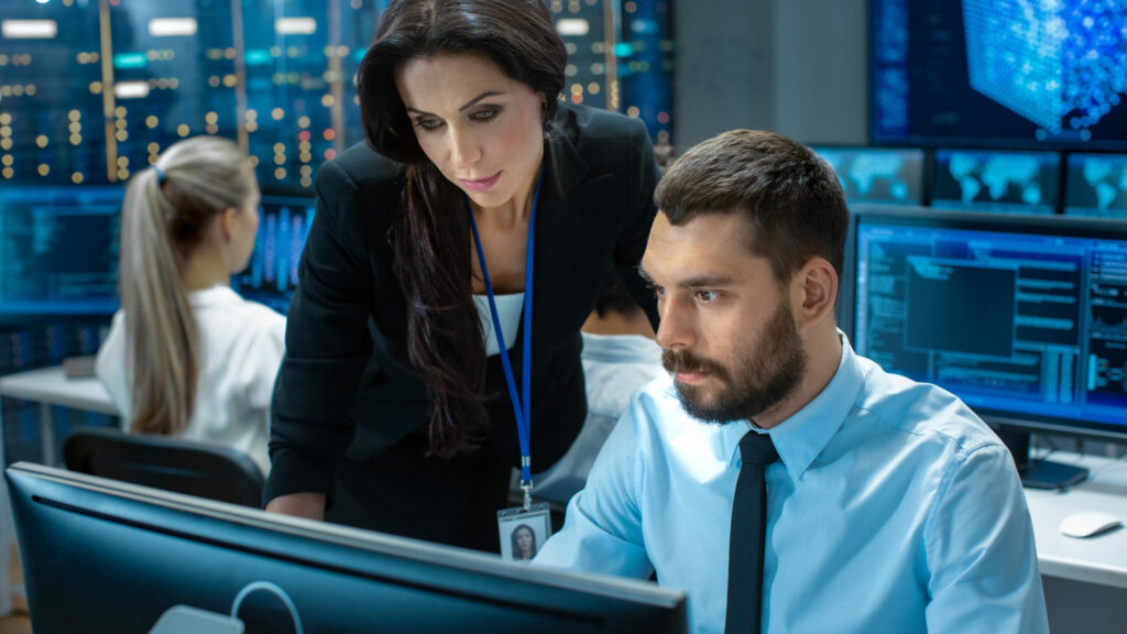  Company IT team reviews security measures for preventing a data breach.