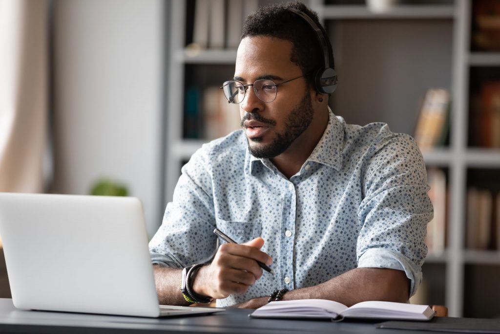 Close up of a young african american businessman on a zoom call.