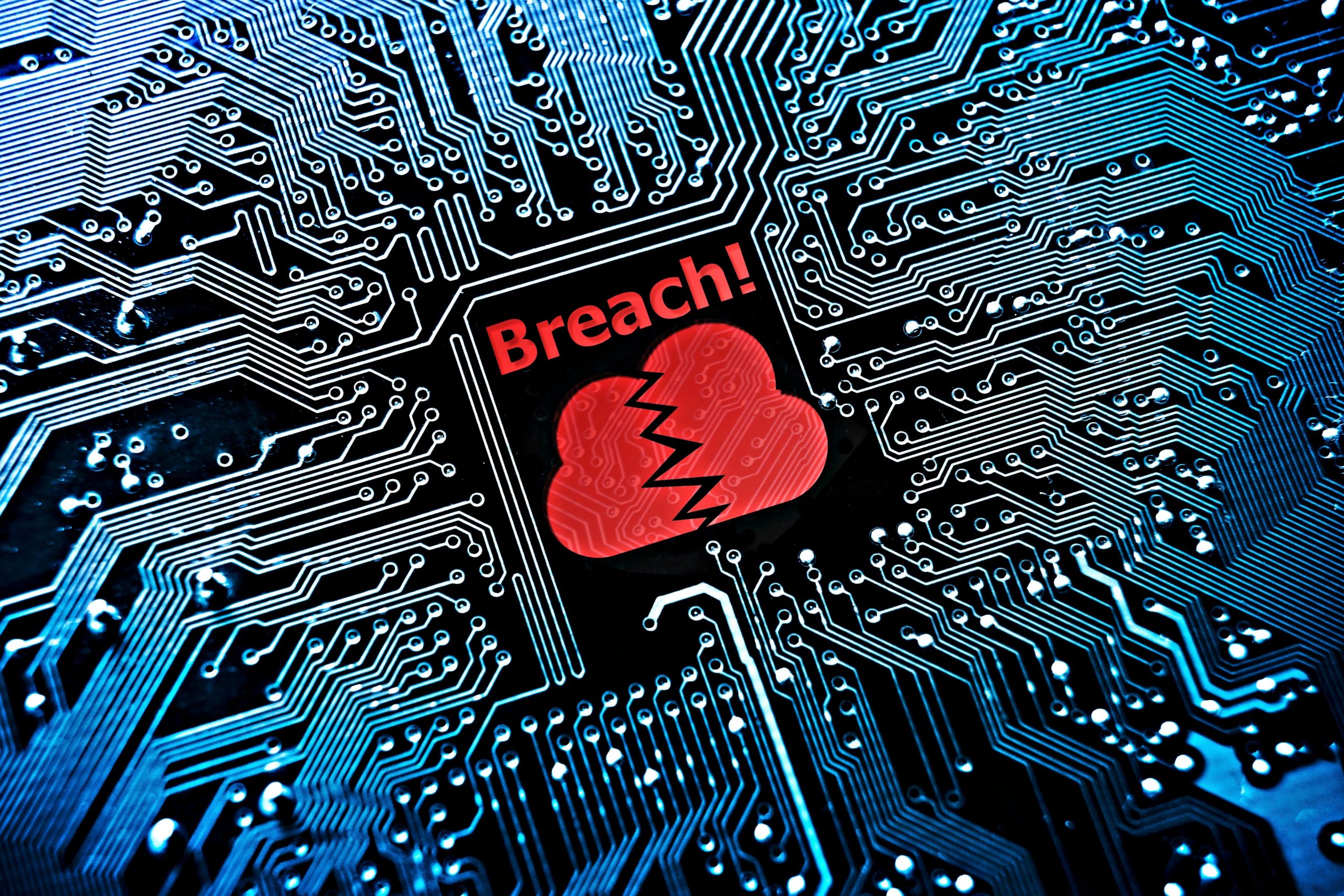 Data breach concept. Illustration of a blue circuit board with a hacker symbol in the middle in red